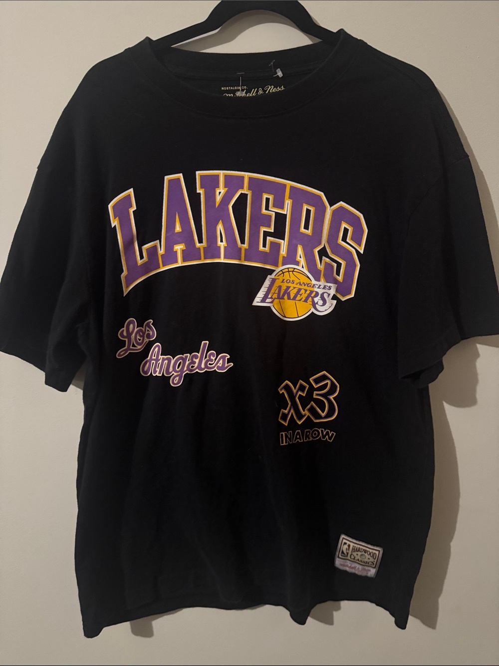 Mitchell & Ness Black Los Angeles Lakers Graphic Tee with Purple & Gold Logo